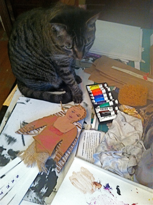 Isabelle kitty helps paint doll