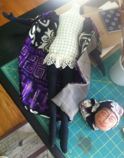 Cloth doll in process of a re-do 