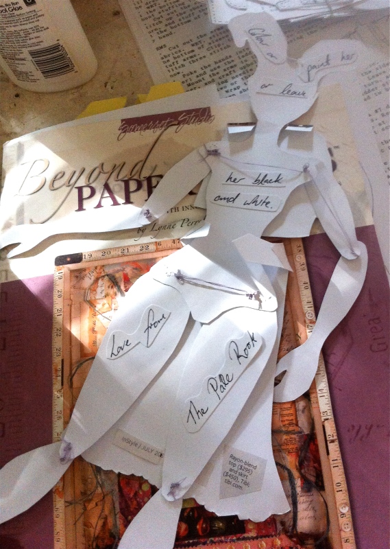 I pasted notes by The Pale Rook on back. I dressed the doll with cut outs from a fashion magazine